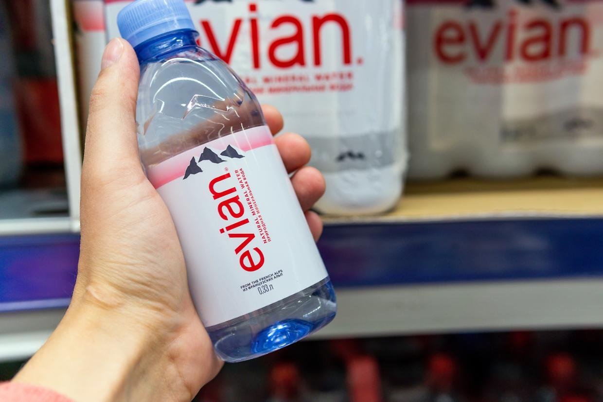 Tyumen, Russia-June 05, 2020: Bottle Of Evian Natural Mineral Water. Made in France. Half life bottle. in the hypermarket