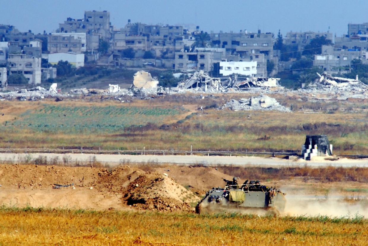 Israeli soldiers in armed vehicle near Gaza strip