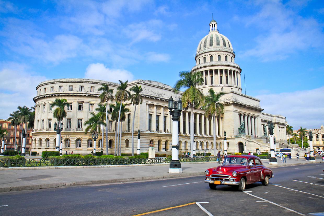 Classic cars in front of the Capitol  in Havana. Cuba