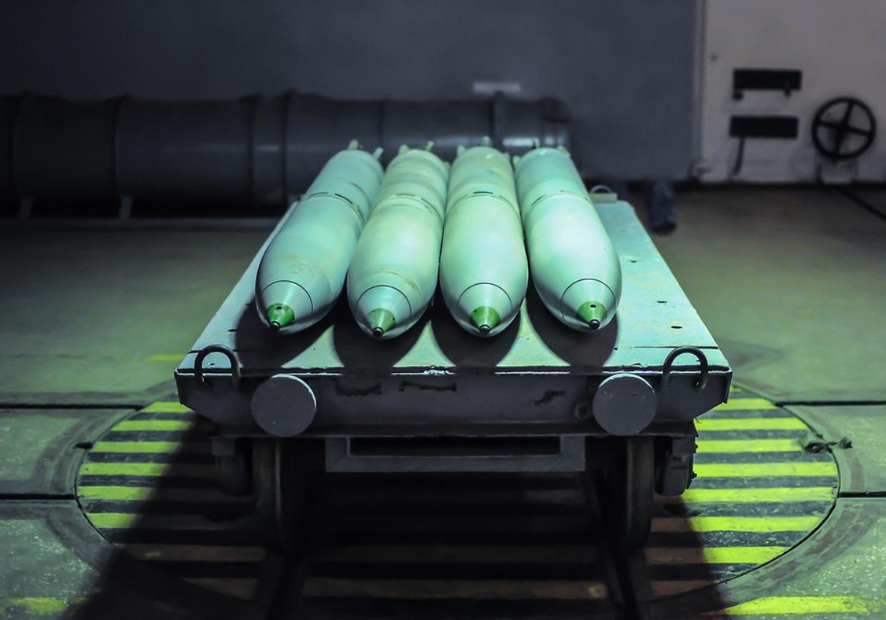 Old combat torpedoes for submarines in an underground storage bunker