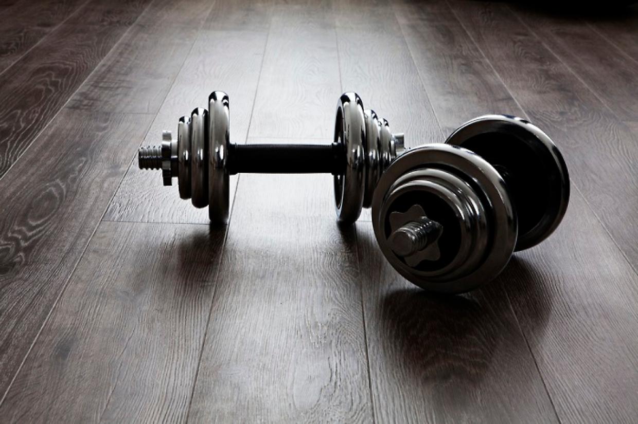 dumbells on wooden floor