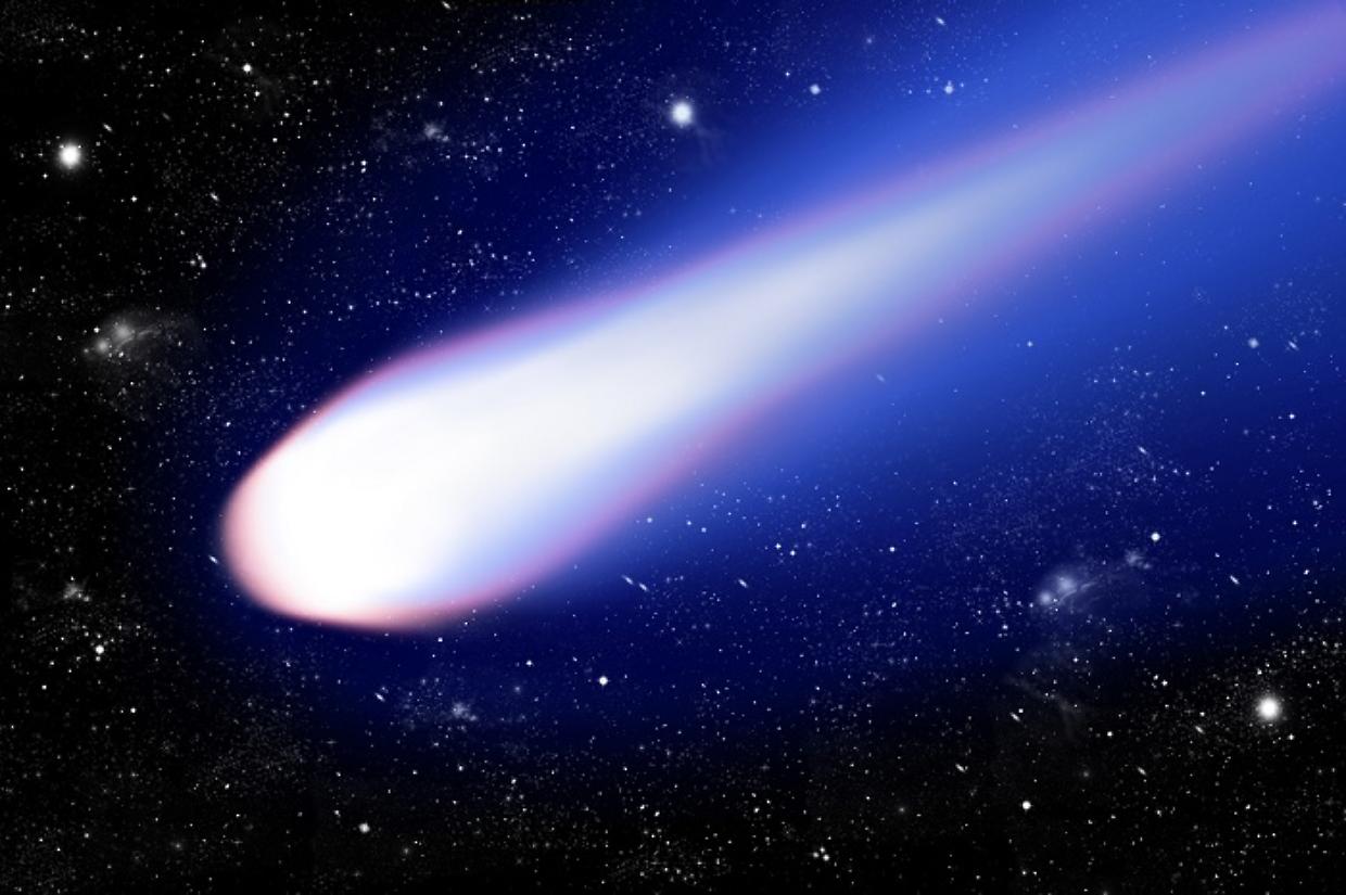 blue comet with shiny tail on black starlit space background,