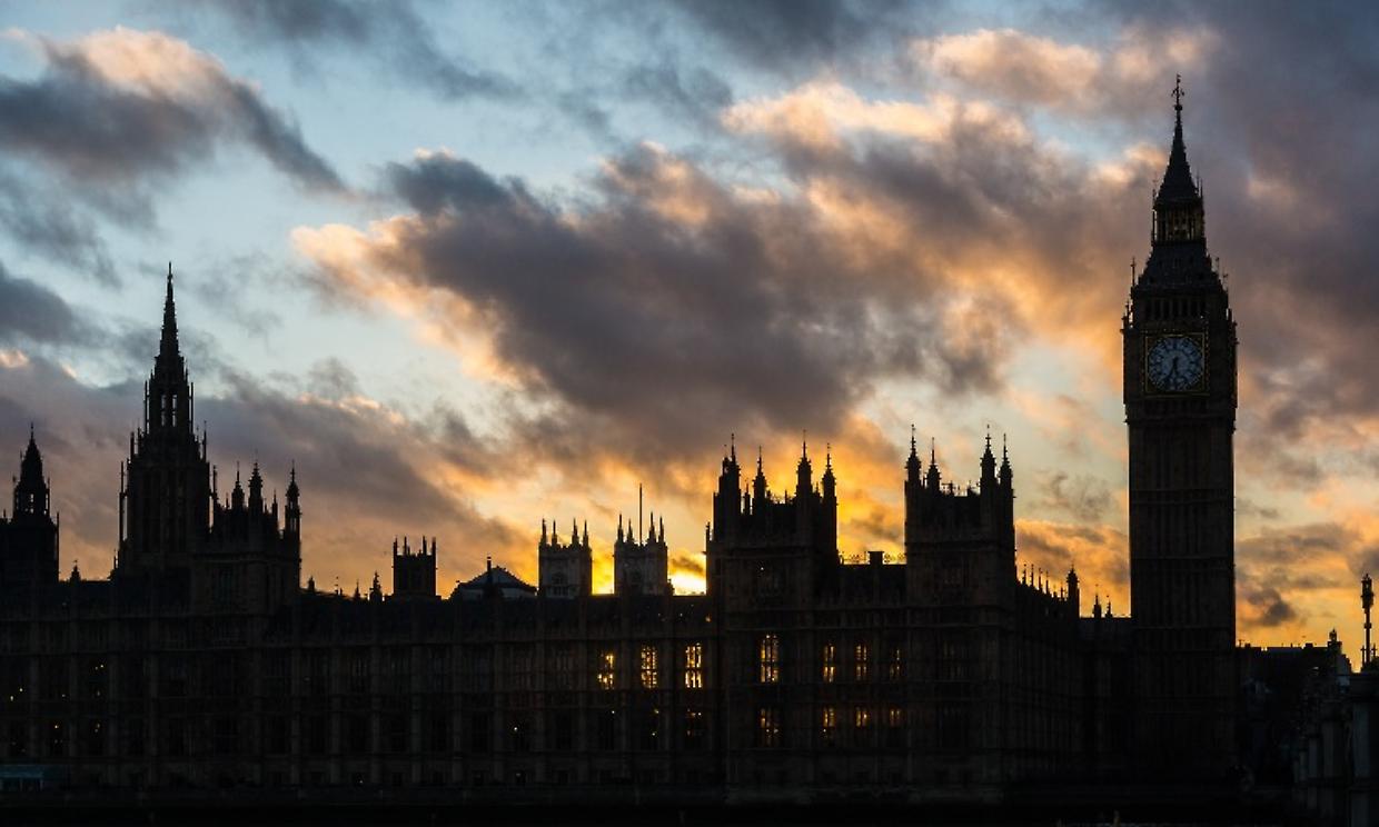 Westminster palace and Big Ben in London at sunset