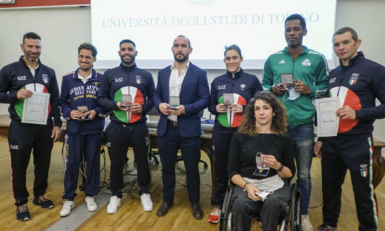 campioni tokyo premiati unito