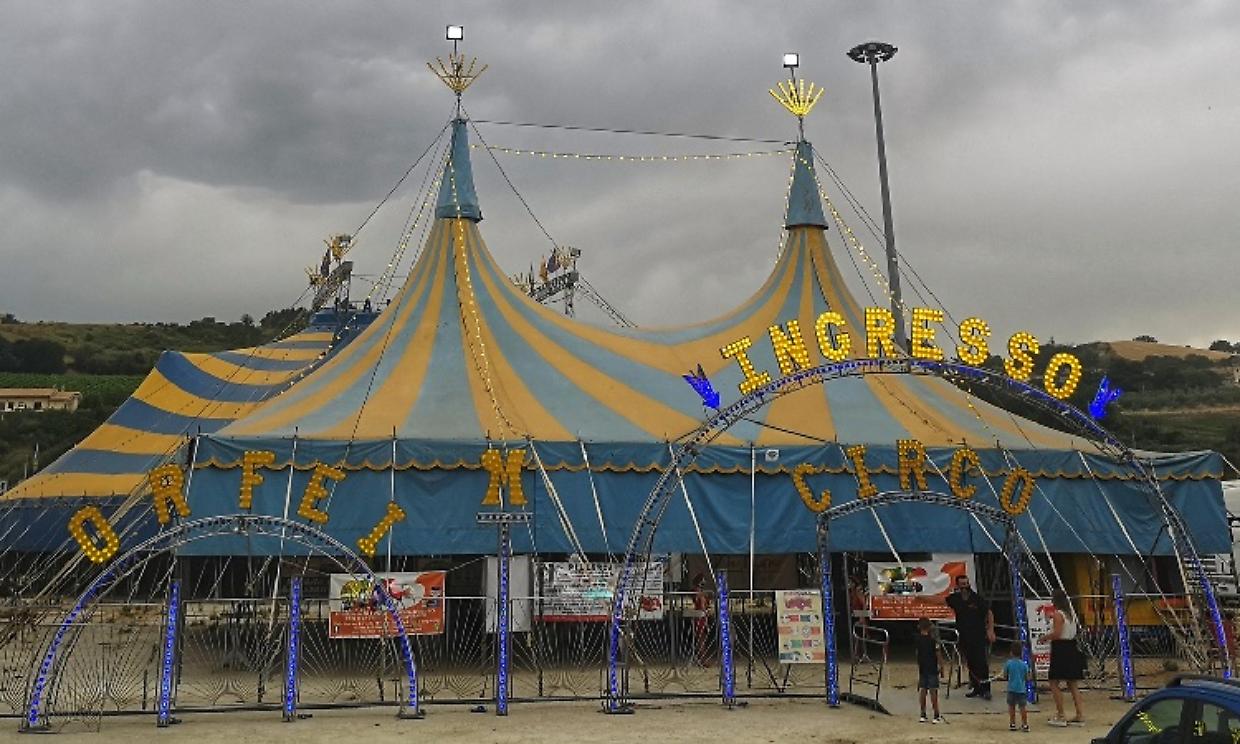 SILVI MARINA, ITALY - Jul 17, 2021: Orfei circus tent set up in a large space in Silvi Marina, Italy