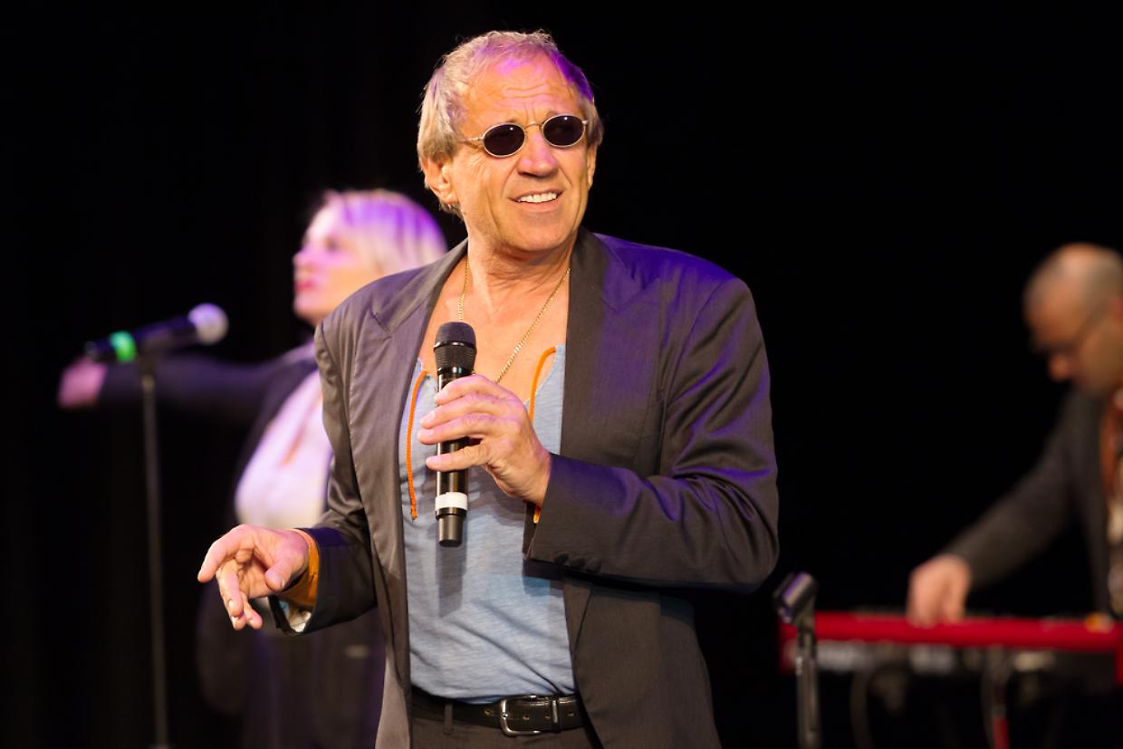 ODESSA, UKRAINE - Nov. 1, 2019: concert performance by Adriano Celentano. Soloist of the music group - Adolfo Sebastiani - famous singer, showman Celentano. Tribute Show Celentano. Italian pop legend