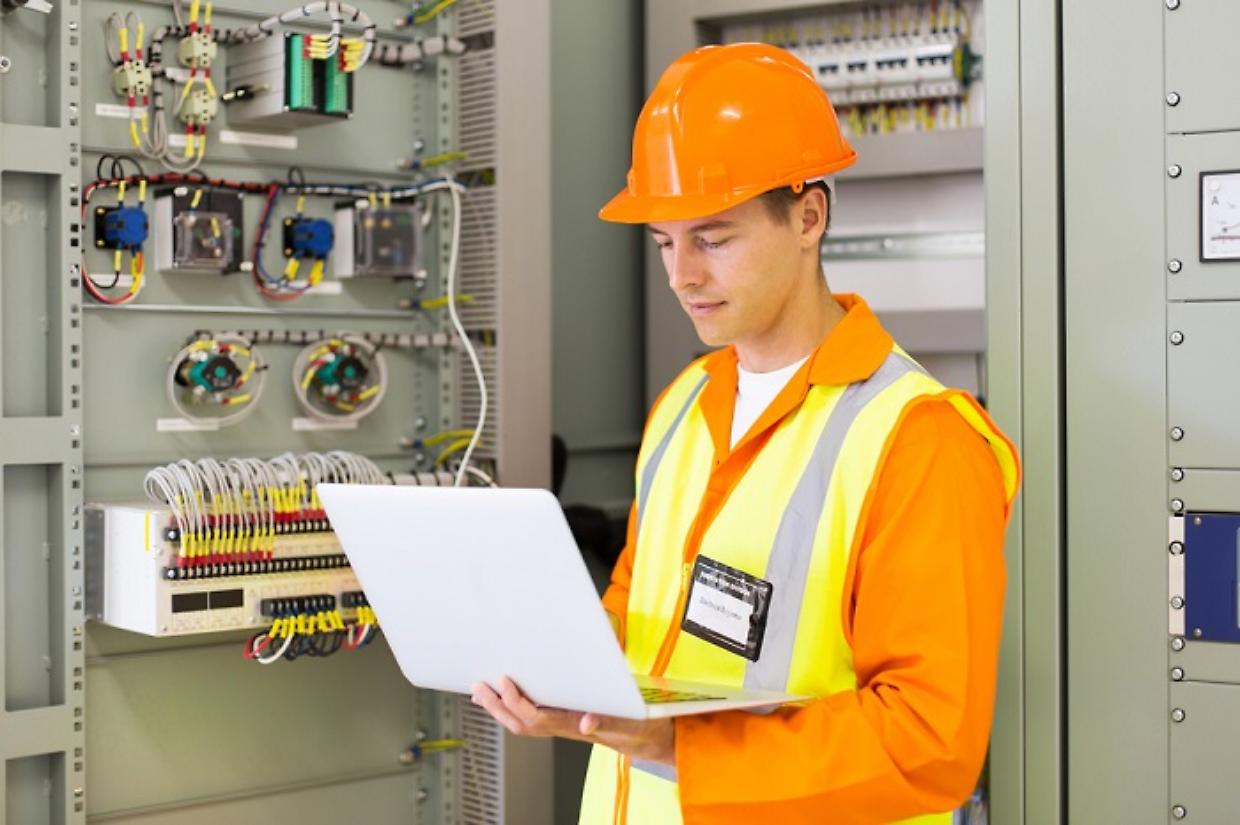 industrial engineer using laptop computer