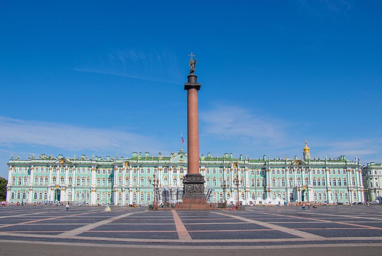 Russia, St. Petersburg, July 19, 2020 Palace Square, in the photo the building of the Hermitage and the Pillar of Alexandria, tourists walking around the square.