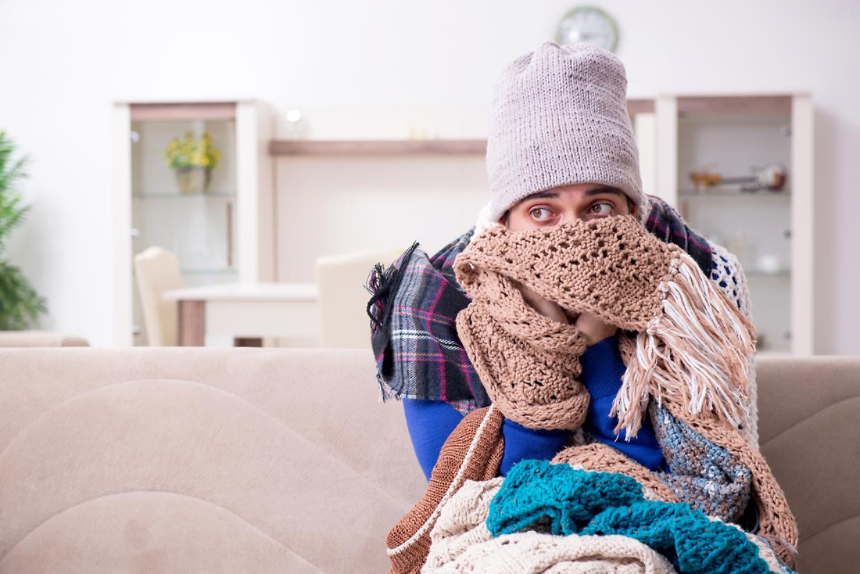 Young man suffering at home