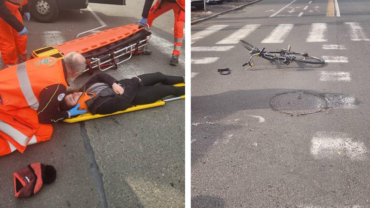 I sanitari soccorrono la ciclista e, a destra, la bici distrutta