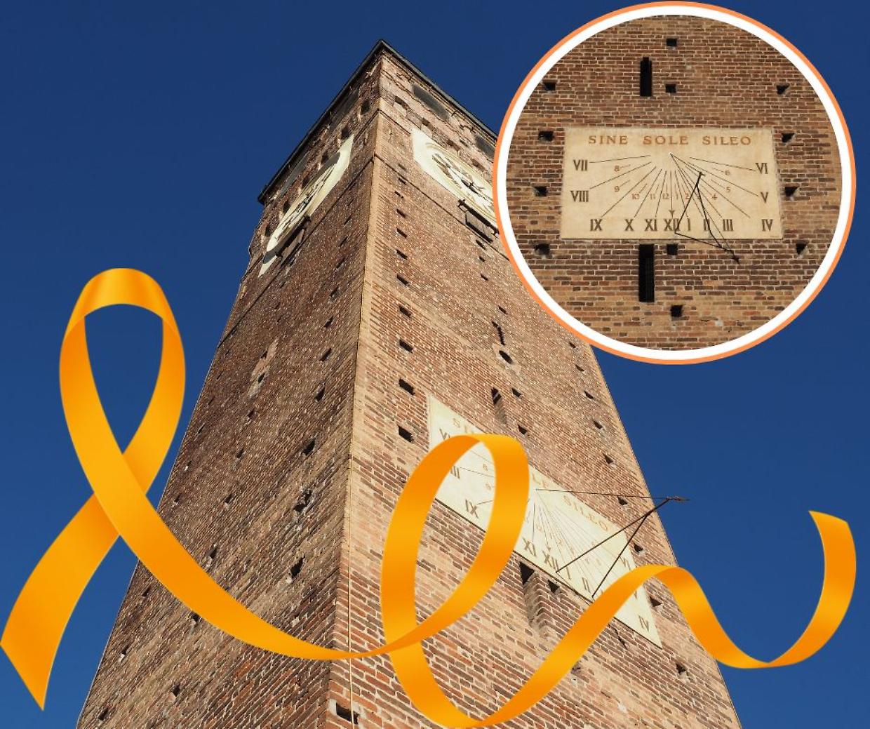 Una luce arancione sulla torre civica: Grugliasco per la ricerca contro una malattia rara