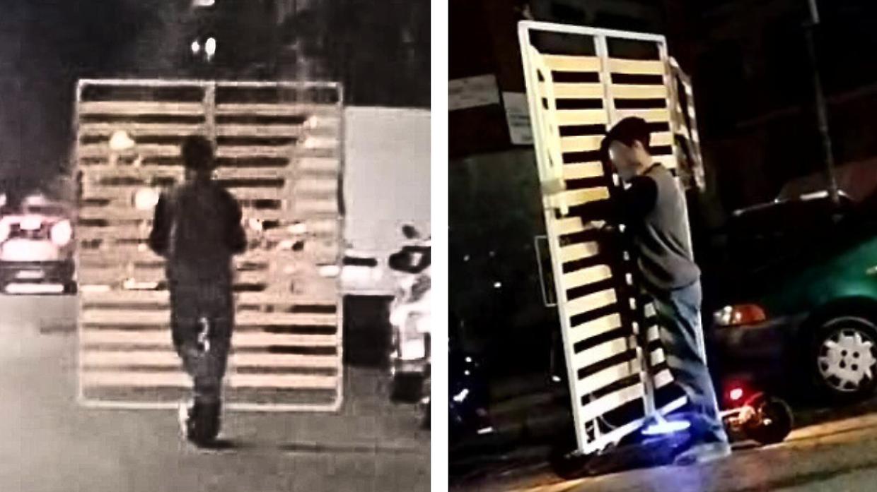 In strada sul monopattino con la rete di un letto. L'insolito trasloco nelle vie di Torino