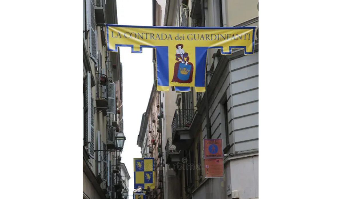 Cosa significano le bandiere della Contrada dei Guardinfanti? Il mistero di un nome nato per proteggere la vita (e nascondere scandali)