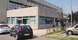 Volti coperti e pistole in pugno. Ma per i banditi bottino magro