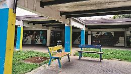 La rinascita del vecchio portico: i murales cancellano il degrado