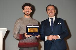 "Pecco" Bagnaia e gli eroi del lavoro: celebrazione di passione e determinazione