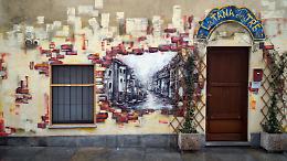 Vandalismo a Borgo Dora: un murales coperto e una comunità ferita