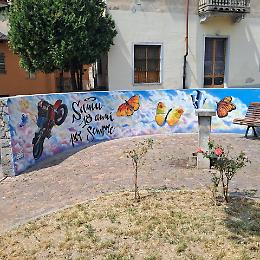 Bussoleno, restaurato il murale in memoria di Samuele Naitza nel quarto anniversario della sua morte